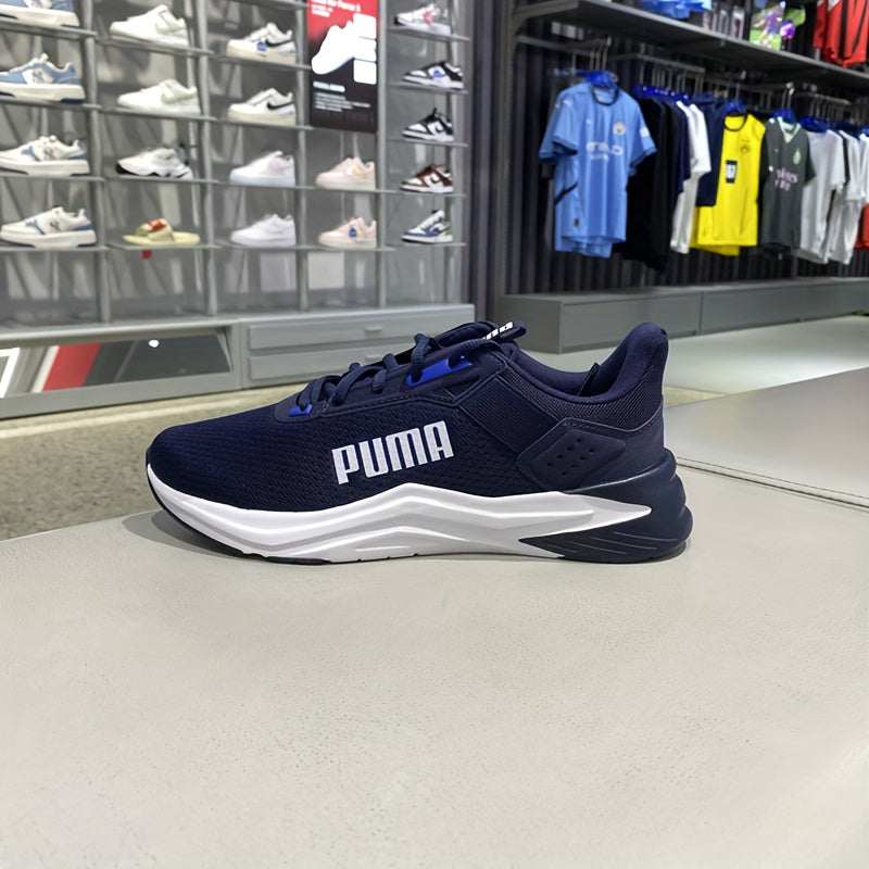 Chaussures PUMA pour hommes légères et breathables, toutes saisons, design bleu marine et blanc, semelle en caoutchouc et upper en fabric, support de stabilité