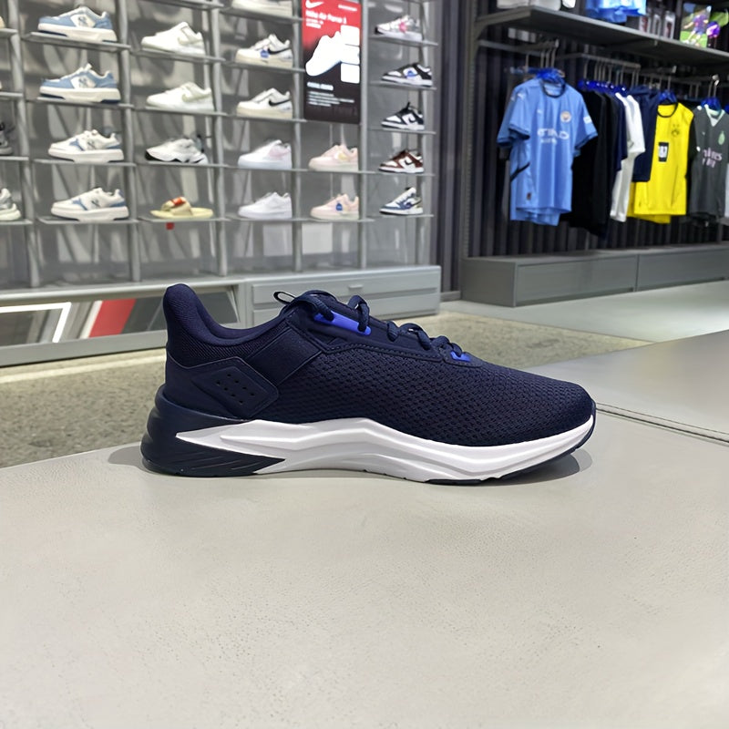 Chaussures PUMA pour hommes légères et breathables, toutes saisons, design bleu marine et blanc, semelle en caoutchouc et upper en fabric, support de stabilité