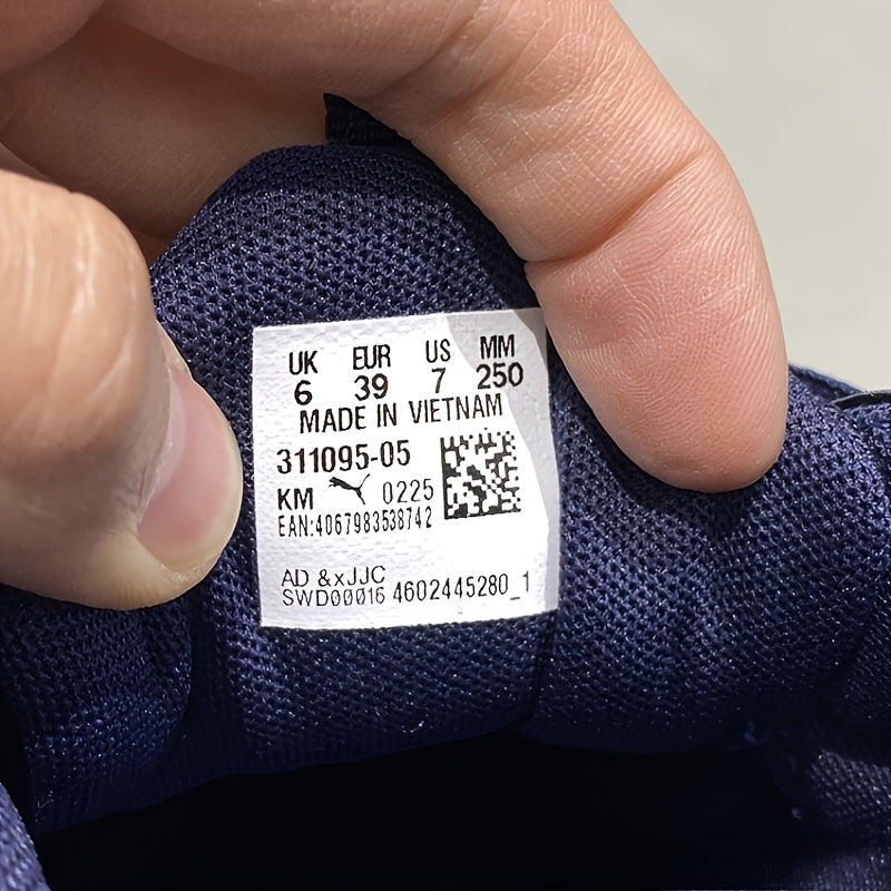 Chaussures PUMA pour hommes légères et breathables, toutes saisons, design bleu marine et blanc, semelle en caoutchouc et upper en fabric, support de stabilité