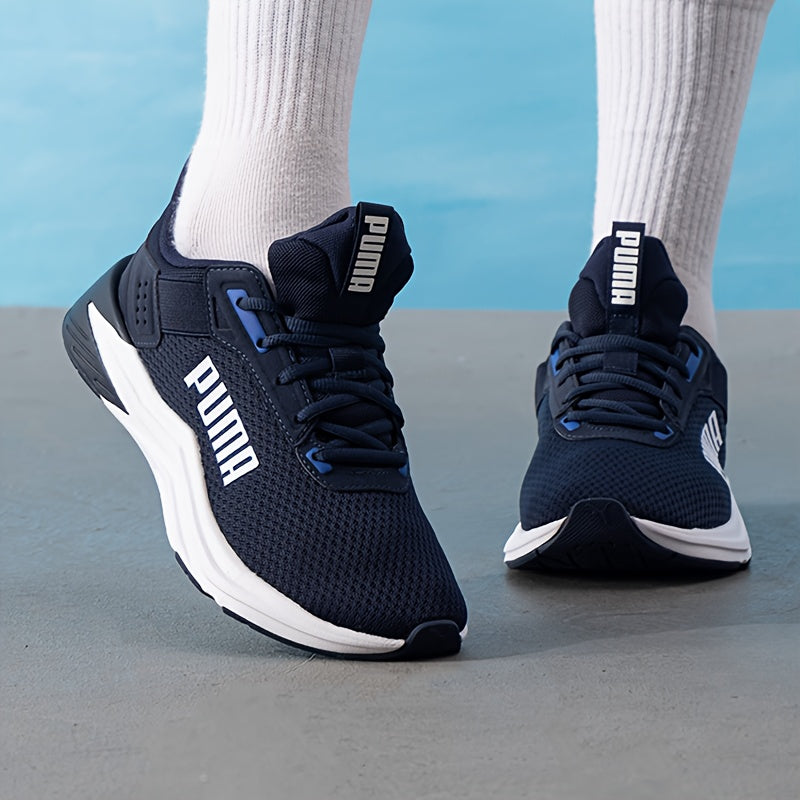 Chaussures PUMA pour hommes légères et breathables, toutes saisons, design bleu marine et blanc, semelle en caoutchouc et upper en fabric, support de stabilité