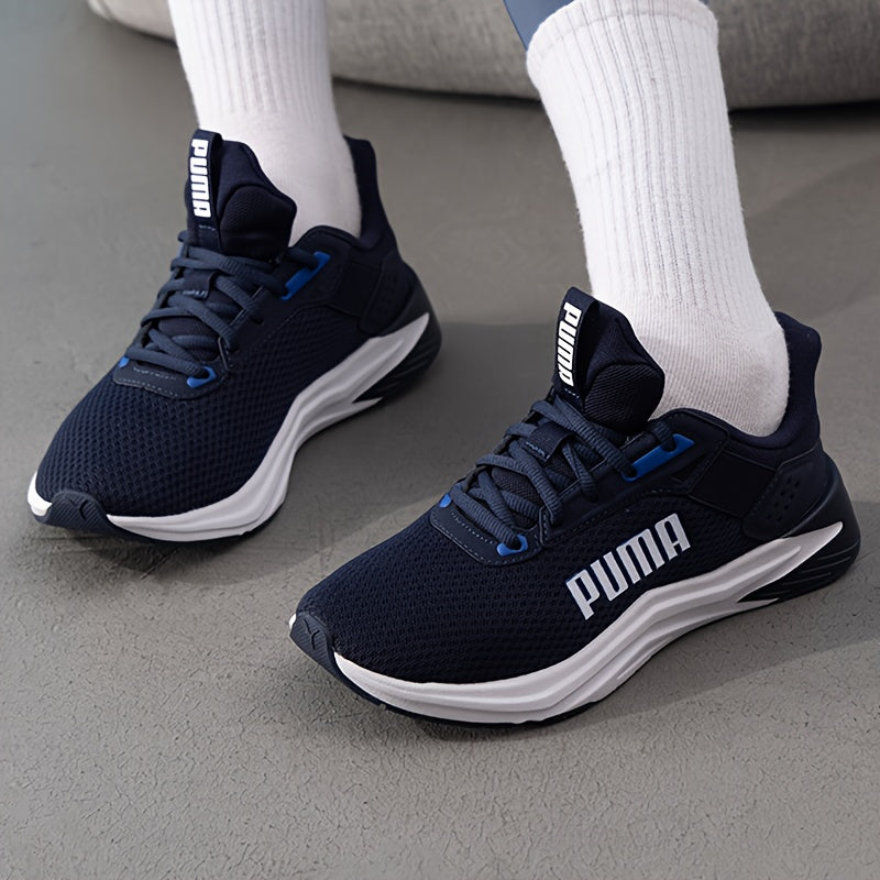 Chaussures PUMA pour hommes légères et breathables, toutes saisons, design bleu marine et blanc, semelle en caoutchouc et upper en fabric, support de stabilité