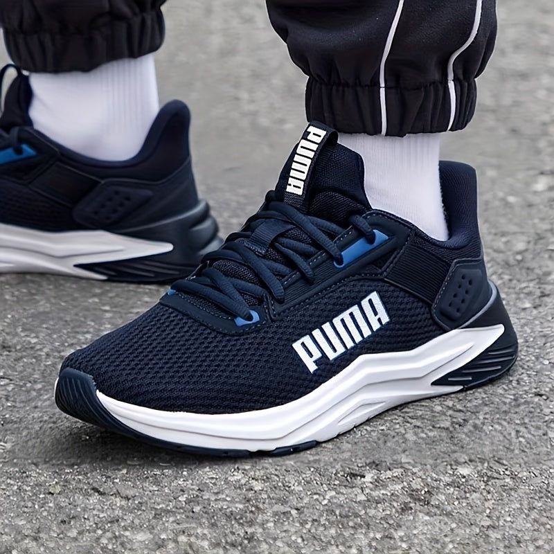 Chaussures PUMA pour hommes légères et breathables, toutes saisons, design bleu marine et blanc, semelle en caoutchouc et upper en fabric, support de stabilité